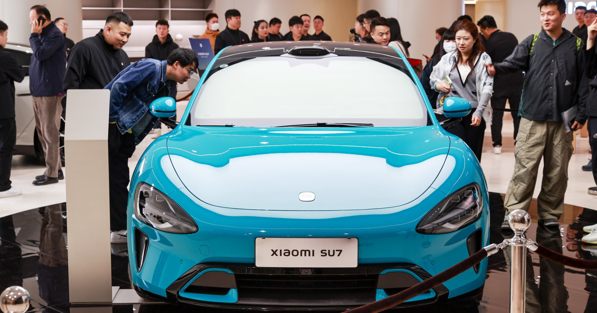 "Xiaomi's Affordable Connected EV Challenges Tesla in Cutthroat Race"
