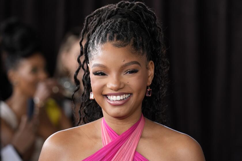Featured image for "Halle Bailey Opens Up About Keeping Her Pregnancy Private and Her Son, Halo"