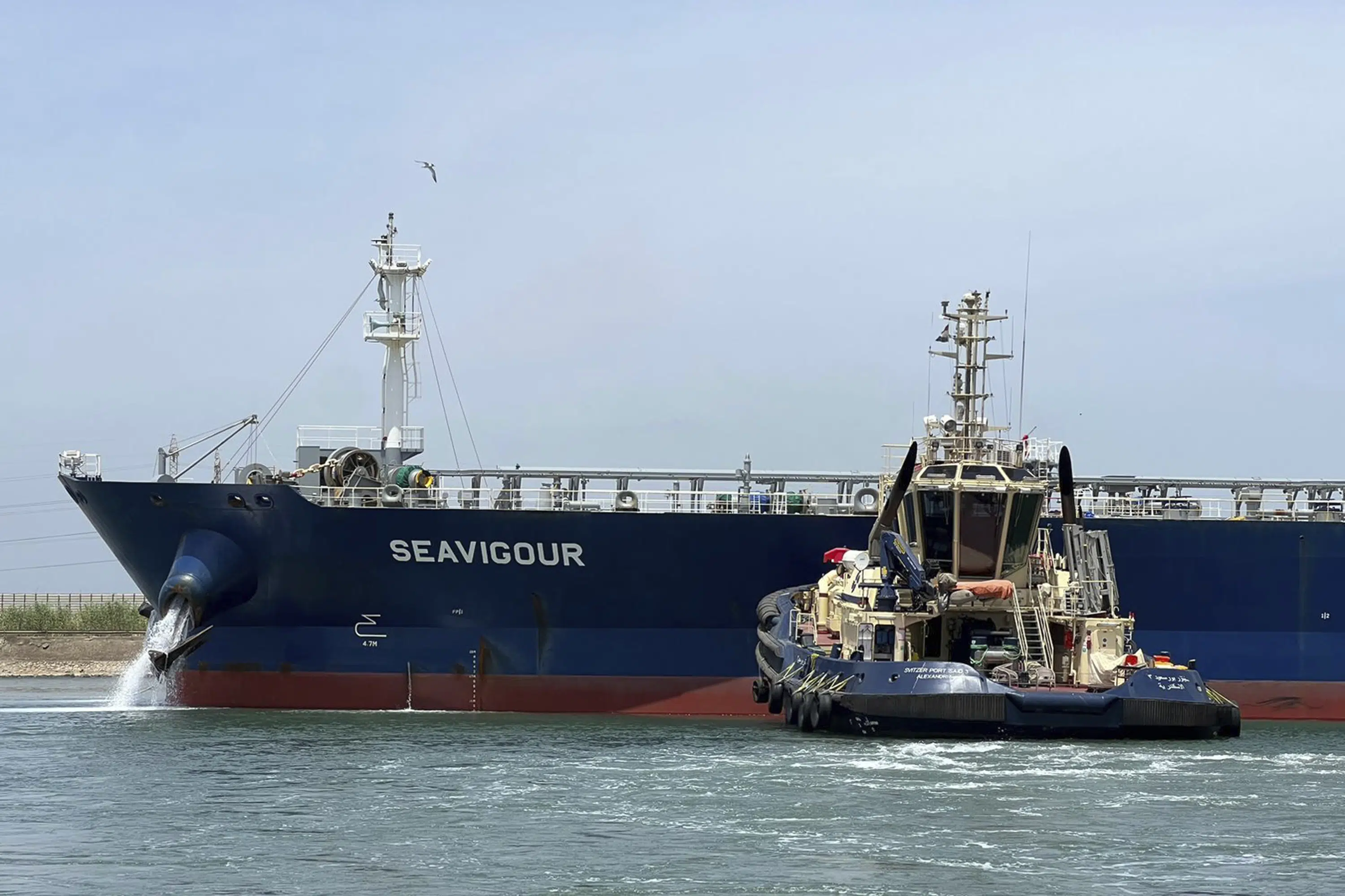 Stranded oil tanker causes traffic disruption in Suez Canal.
