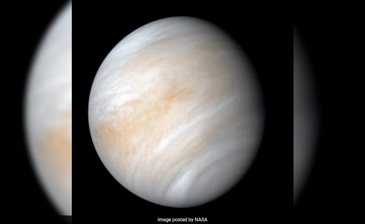 "Study Suggests Rogue Moon Could Be Behind Venus's Unusual Spin Reversal"
