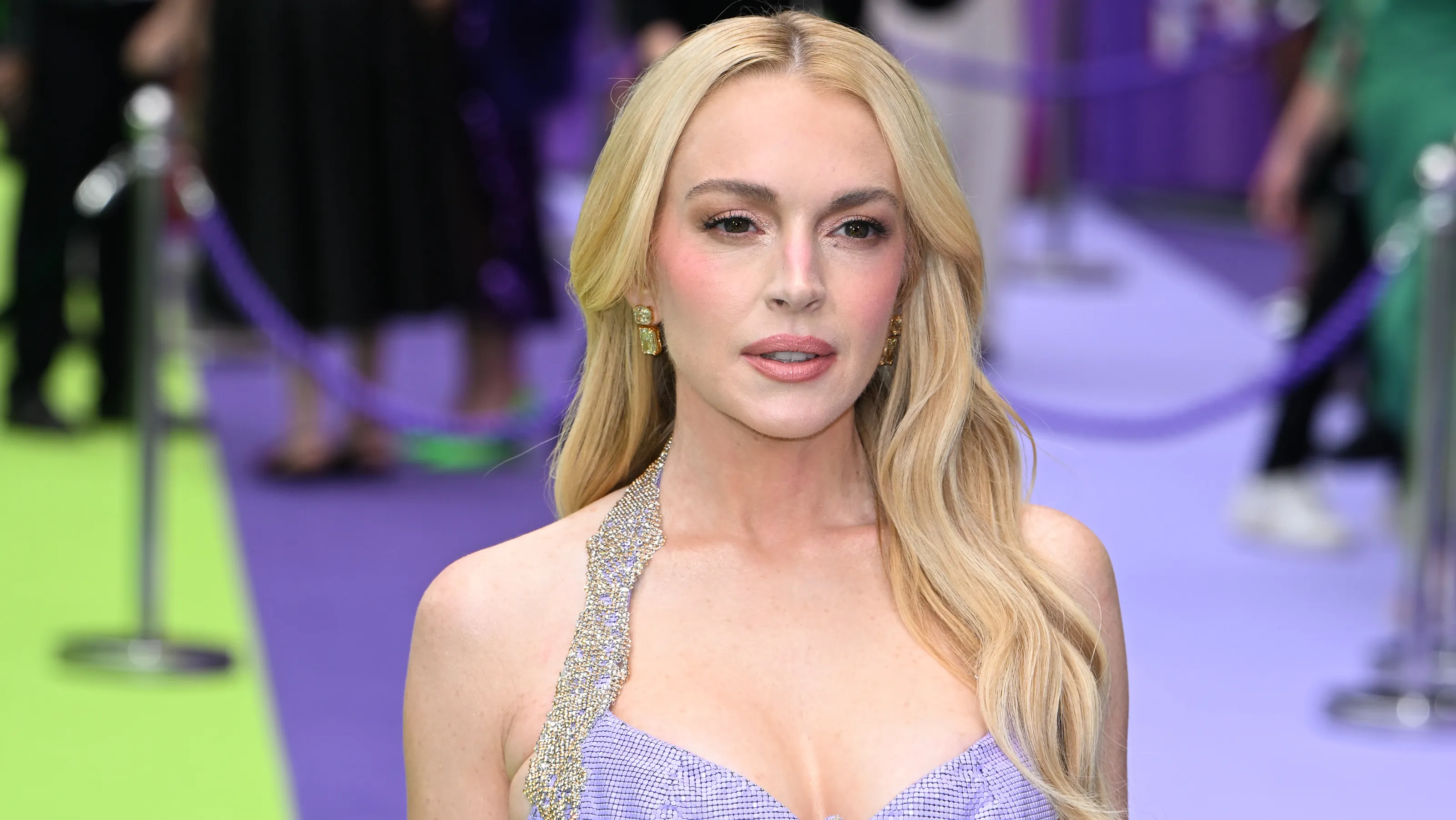 Featured image for Lindsay Lohan Celebrates 'Freaky Friday' with Nostalgic Red Carpet Looks