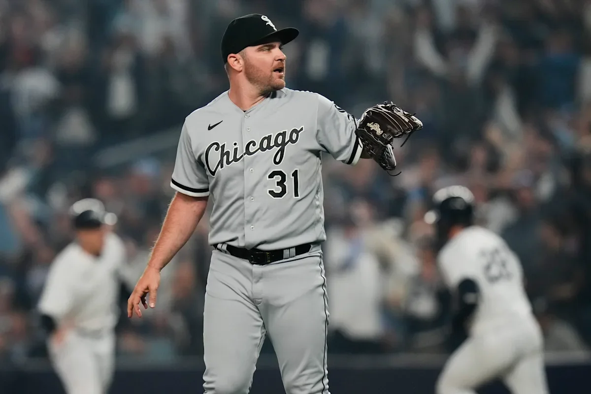 "White Sox Closer Liam Hendriks Faces Setback with Tommy John Surgery Following Non-Hodgkin Lymphoma Battle"