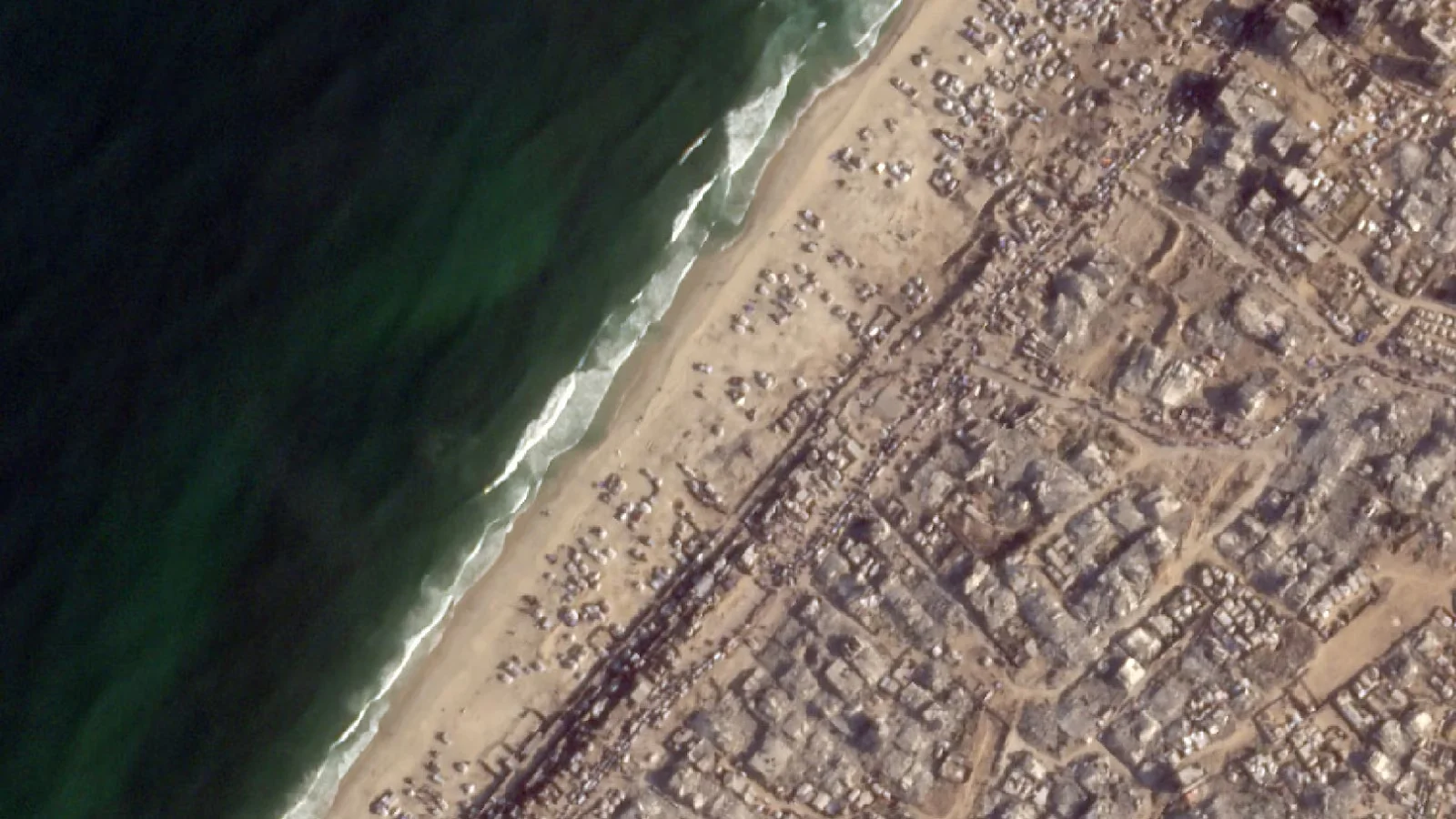 Featured image for Mass Evacuations and Rising Death Toll as Israeli Ground Offensive Escalates in Gaza