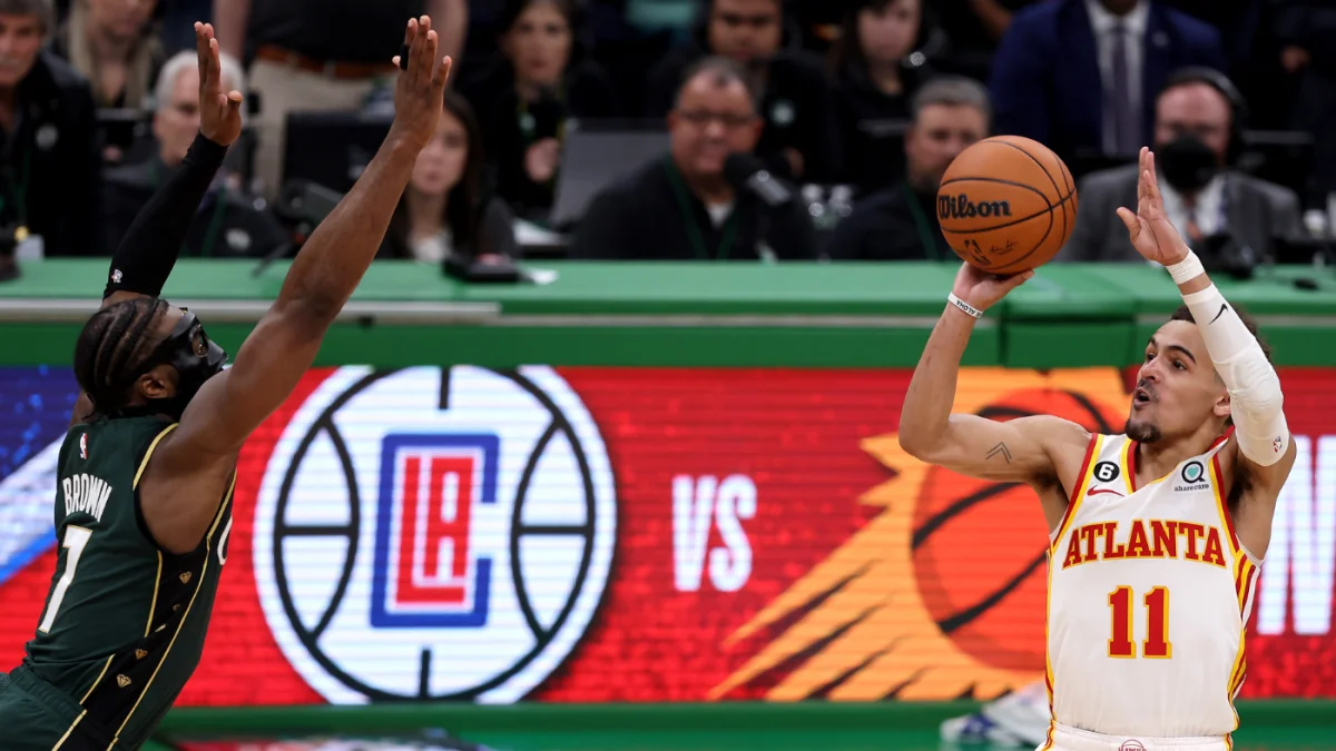 Trae Young's game-winner saves Hawks in playoff series against Celtics.