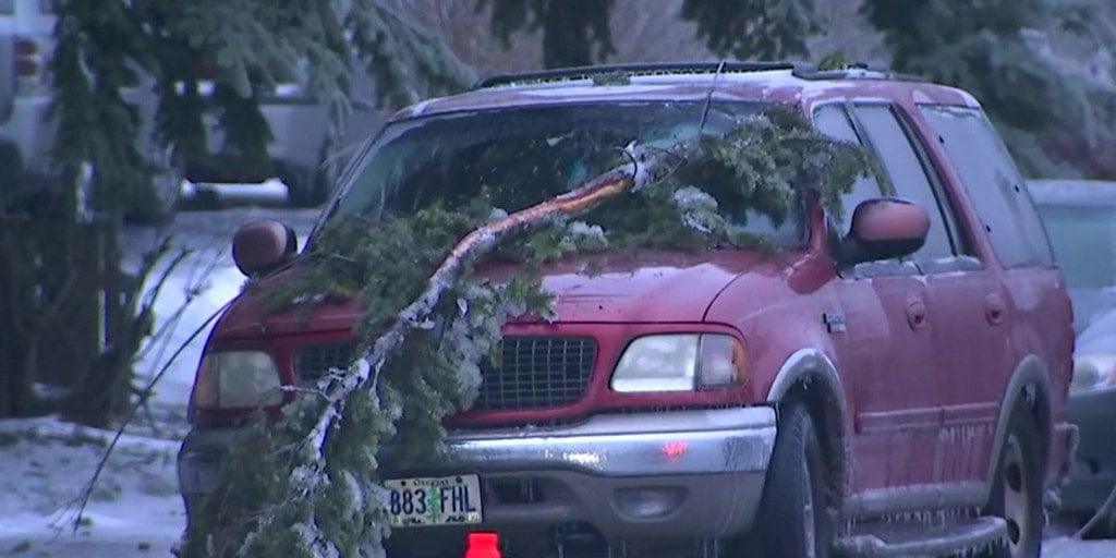 Featured image for "Fatal Portland Ice Storm: 3 Killed as Power Line Falls on SUV"