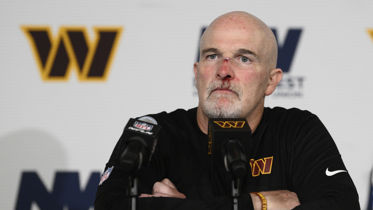 Commanders Coach Dan Quinn Bloodied in Sideline Collision with Marcus Mariota