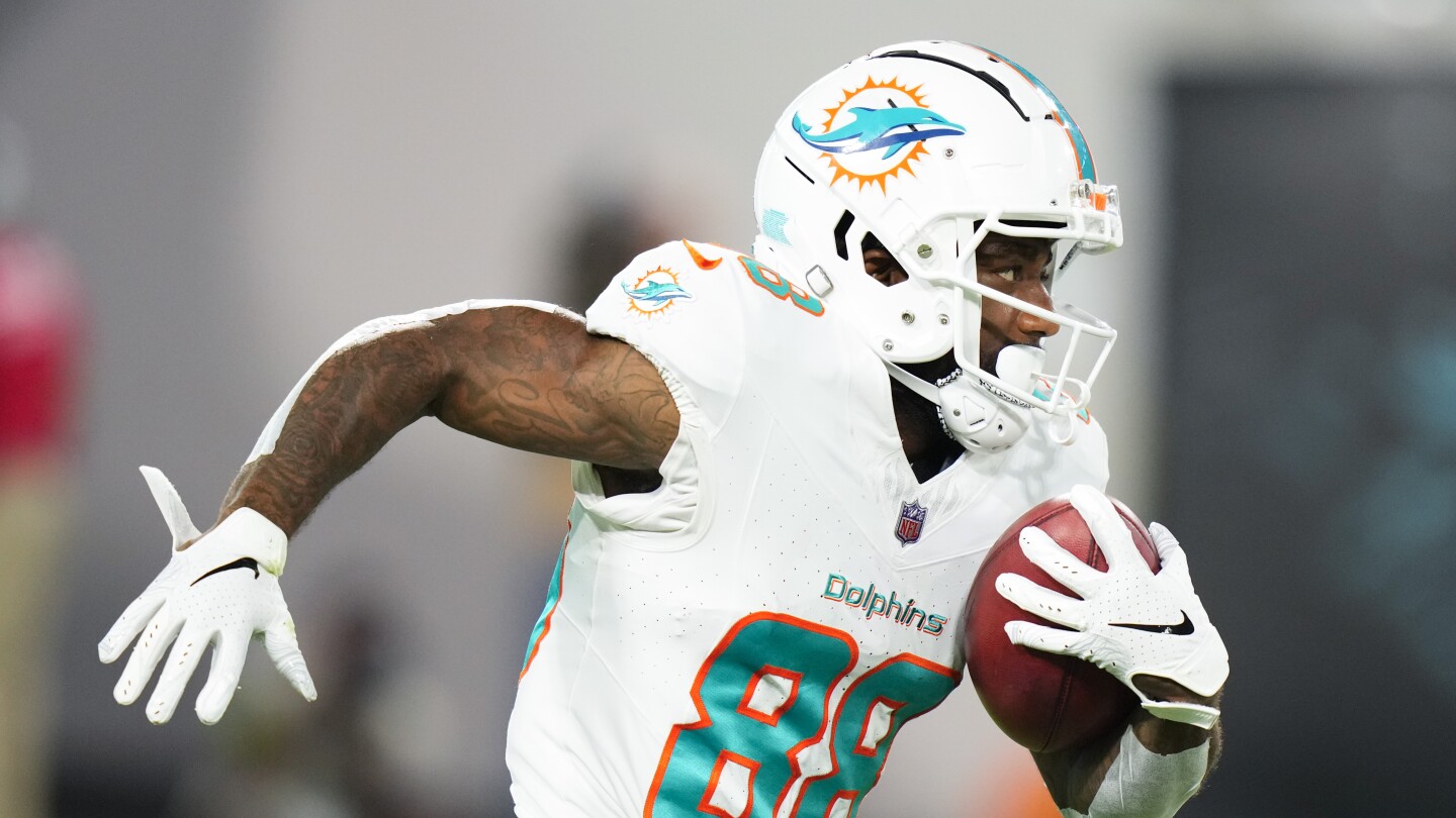"Buzzworthy: Miami Dolphins Trim Roster, Fans Speculate on Implications"