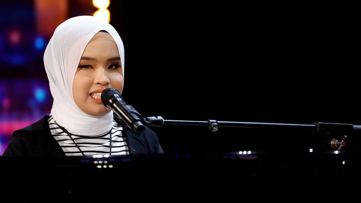Blind 17-year-old singer Putri Ariani earns AGT's Golden Buzzer from Simon Cowell.