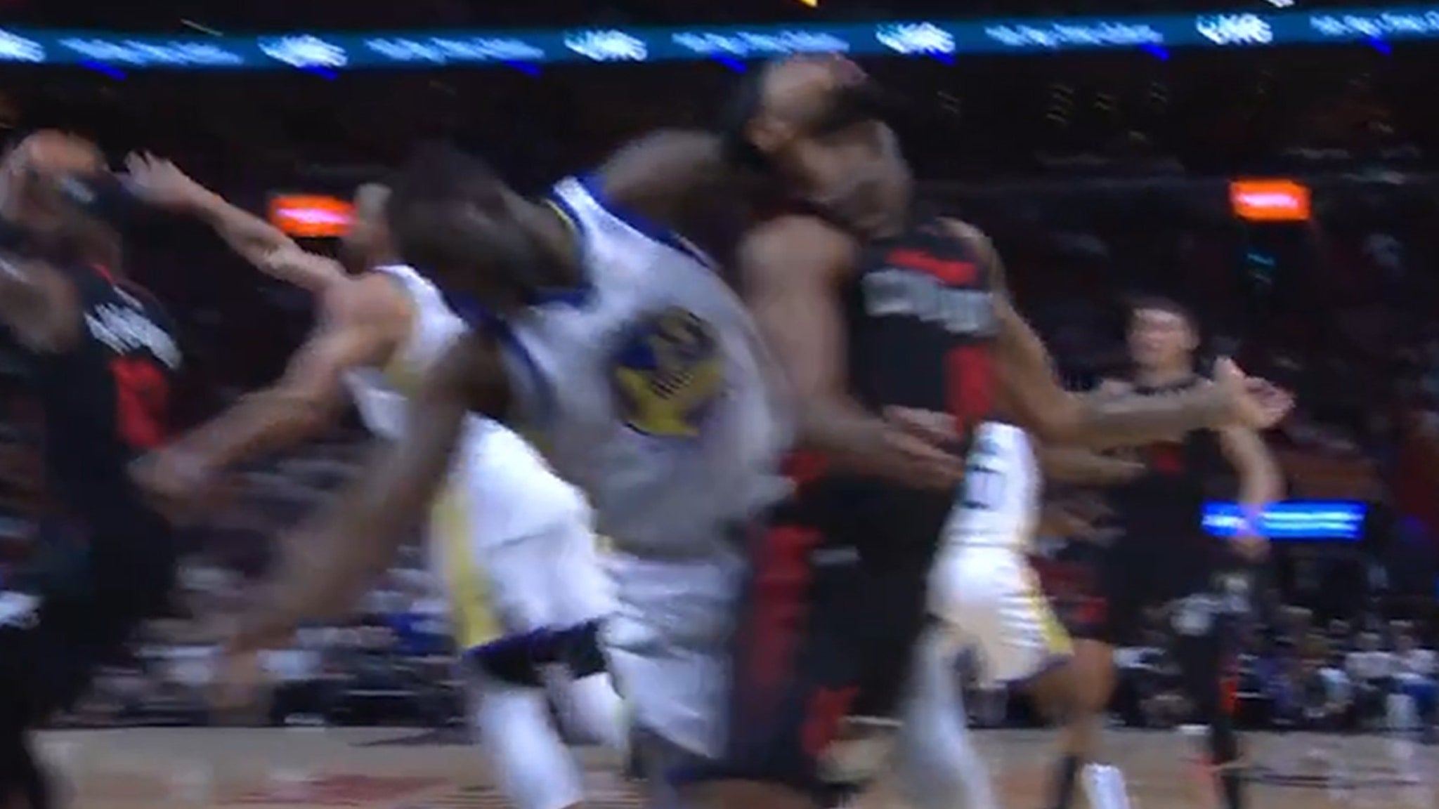 "Draymond Green's Controversial Neck Grab on Patty Mills Sparks NBA Debate"