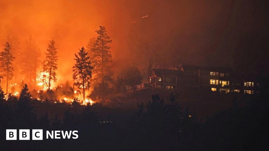 "Mass Evacuations and State of Emergency Declared as Wildfires Threaten Kelowna, British Columbia"