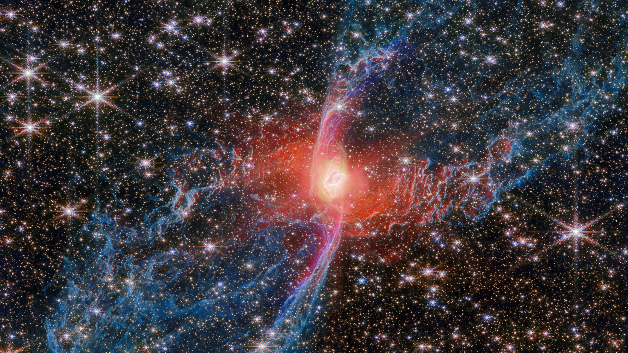 Featured image for James Webb Telescope Unveils Spooky Secrets of the Red Spider Nebula