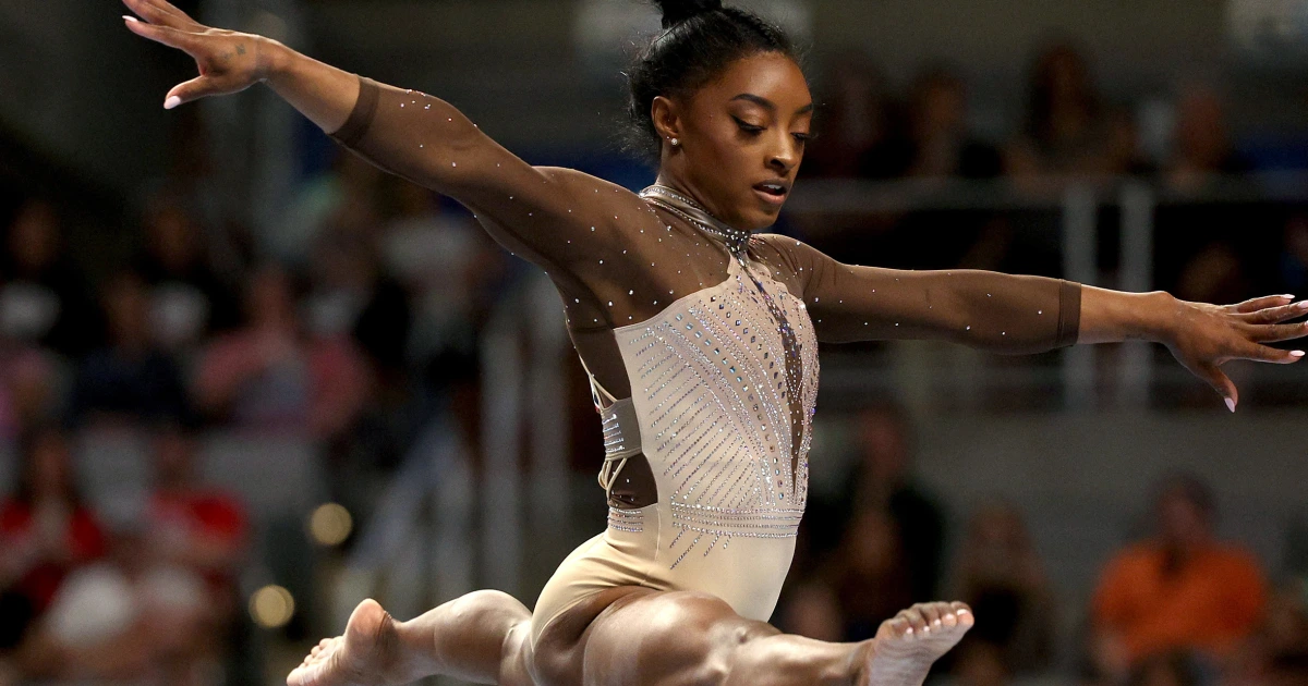 Featured image for Simone Biles Wins Record Ninth Title, Aids Suni Lee to Overcome Challenges