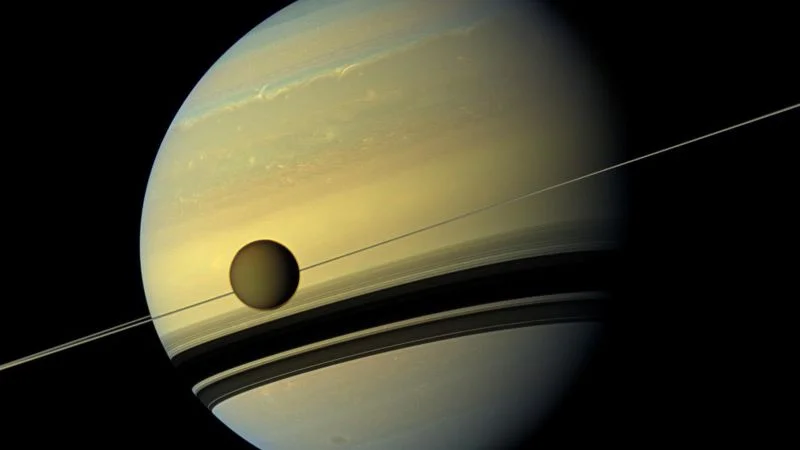 A Cosmic Collision: Titan and a Lost Moon May Have Forged Saturn's Rings