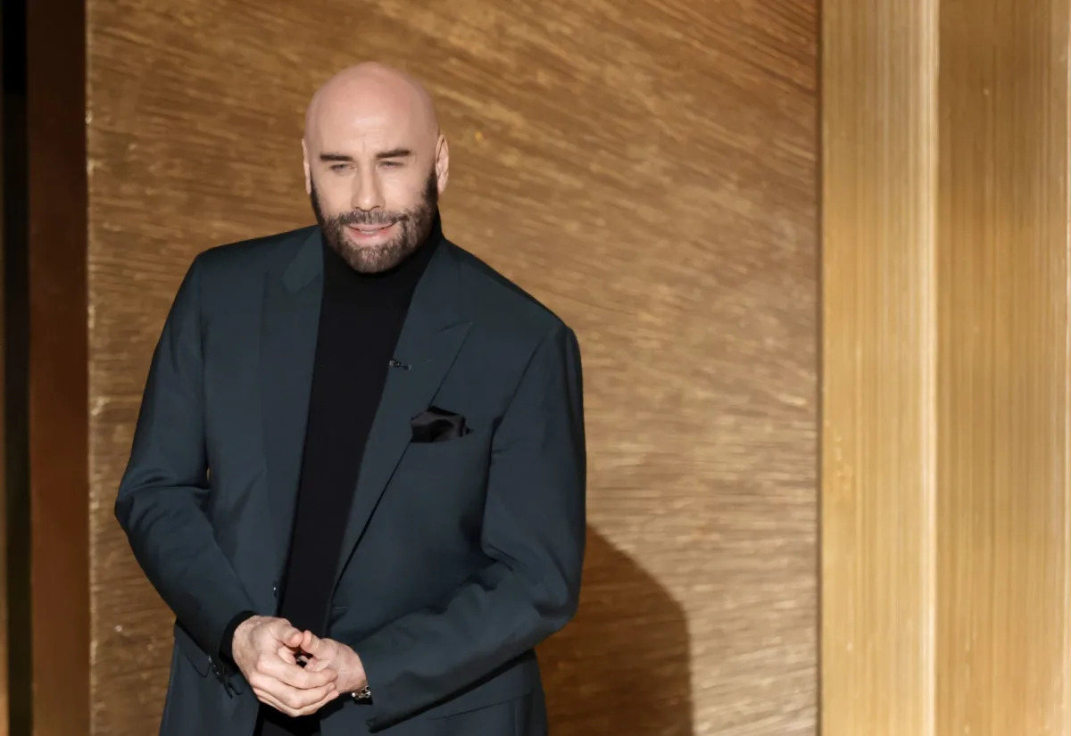 "John Travolta's Controversial Home Photo Ignites Online Outrage"