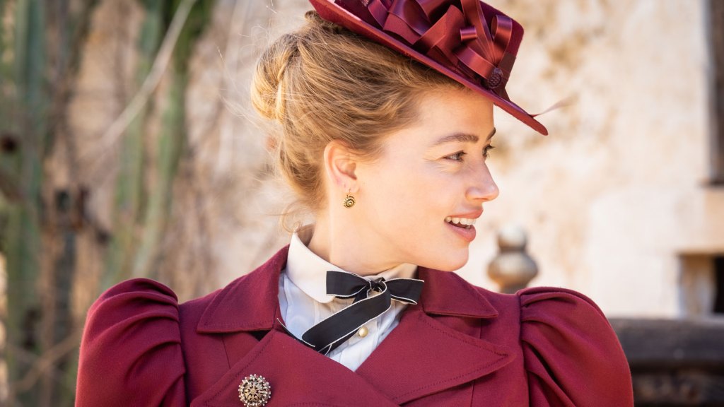 Amber Heard shines at Italian film festival premiere amidst legal drama and praise from co-stars and director.