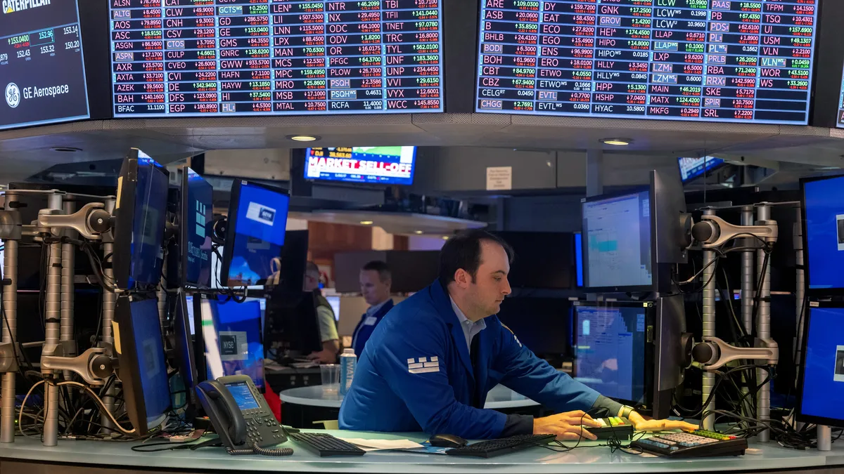 Nasdaq Soars to Record High Amid Tech Rally, Dow Dips