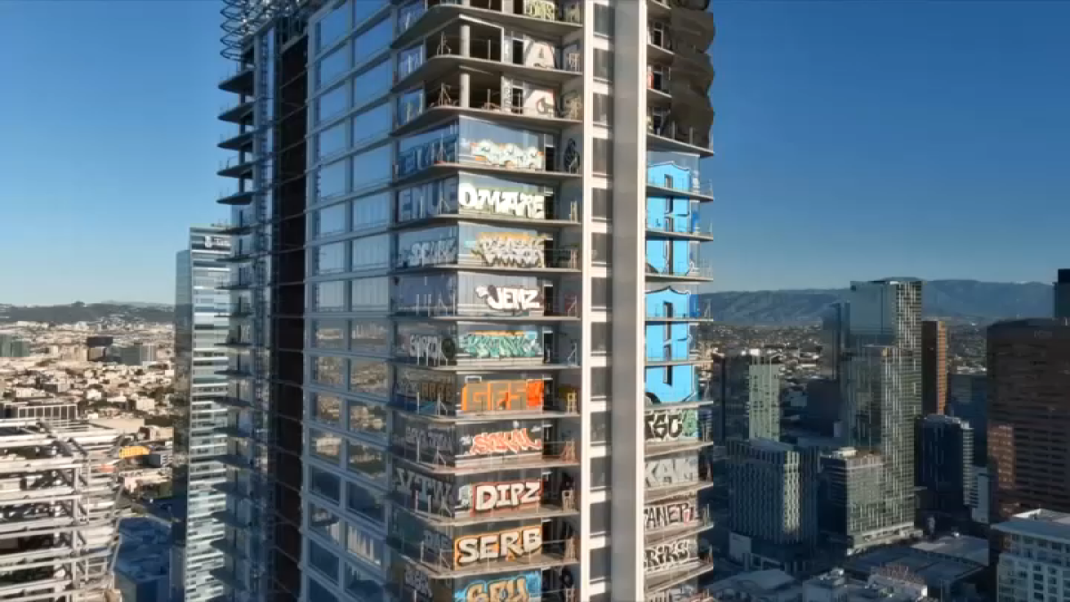 Featured image for Daring BASE Jumpers Leap from Graffiti-Covered Downtown LA Skyscraper