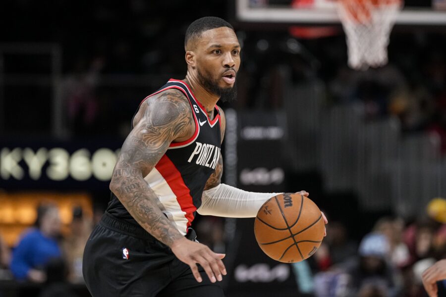 "Jimmy Butler Recruiting Damian Lillard to Heat Amid Trade Rumors and Draft Talks"