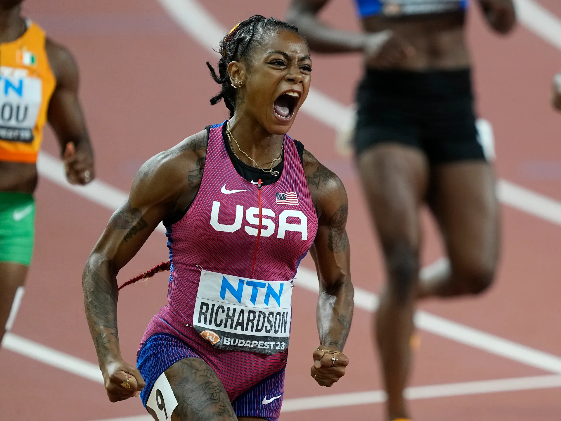 Featured image for Sha'Carri Richardson Shatters Records, Claims Gold in World Athletics Championships 100m