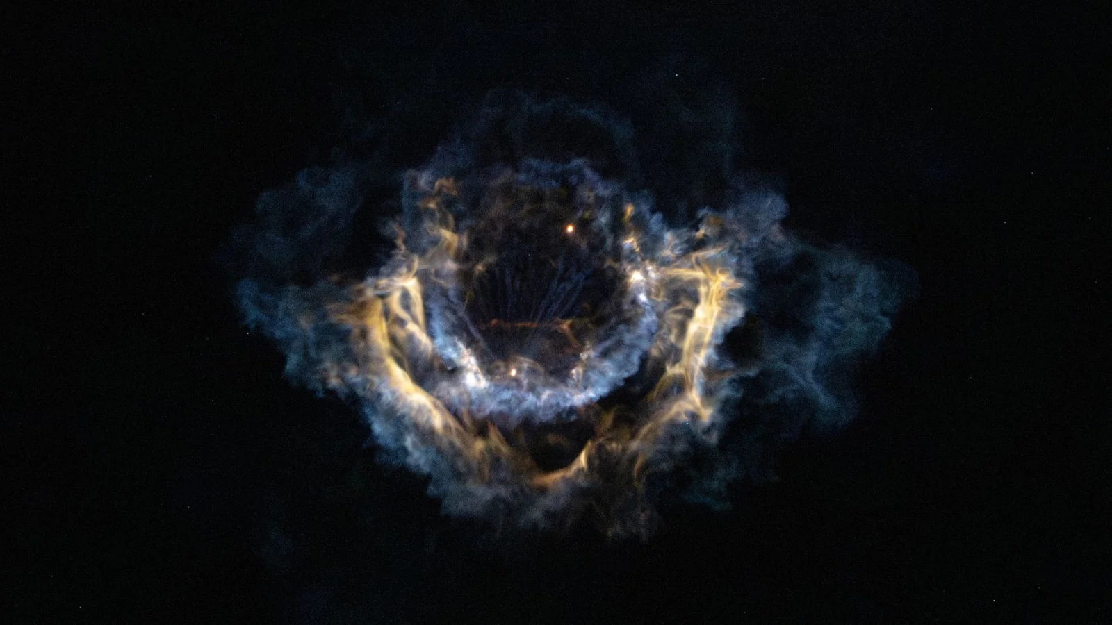 Nebula-like Falcon 9 plume blooms over Cape Canaveral