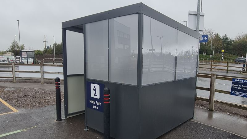 "Online Ridicule for UK Airport's Controversial 'Bus Shelter' Prayer Room"