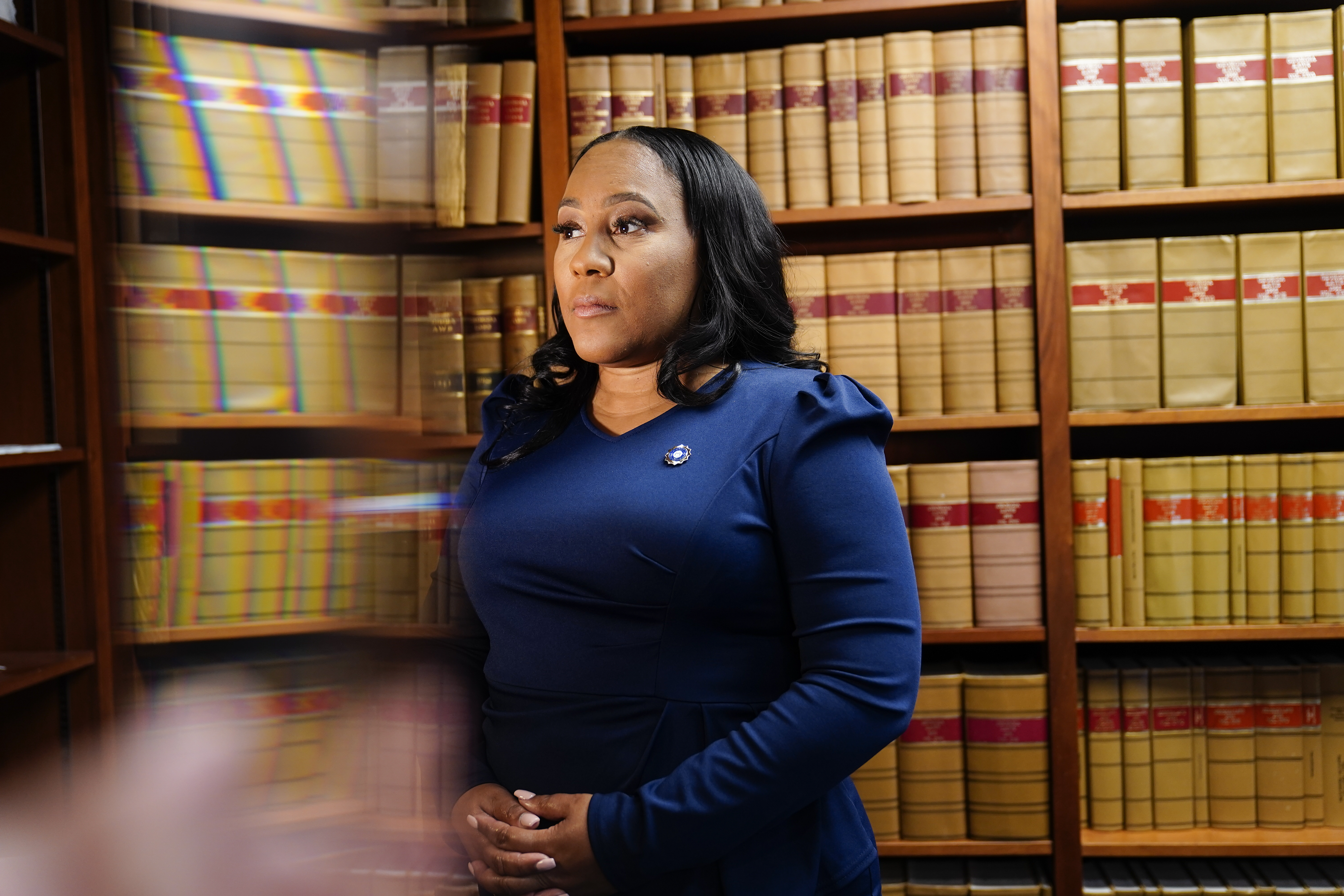 Georgia prosecutor resists Trump's attempts to interfere with election probe.