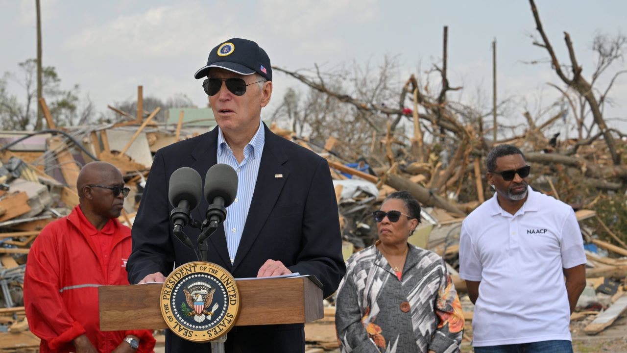 Biden promises aid and support during visit to tornado-hit Mississippi town.