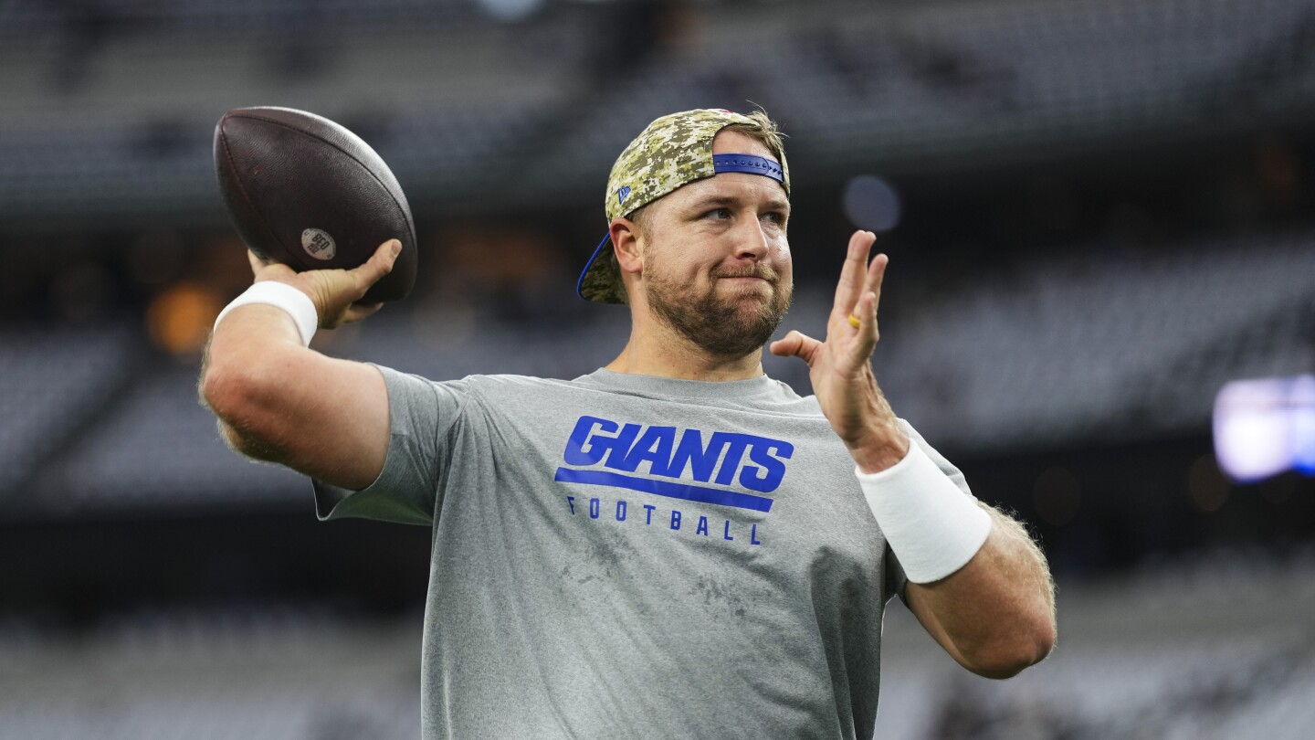 "Giants' QB Dilemma: DeVito or Taylor?"
