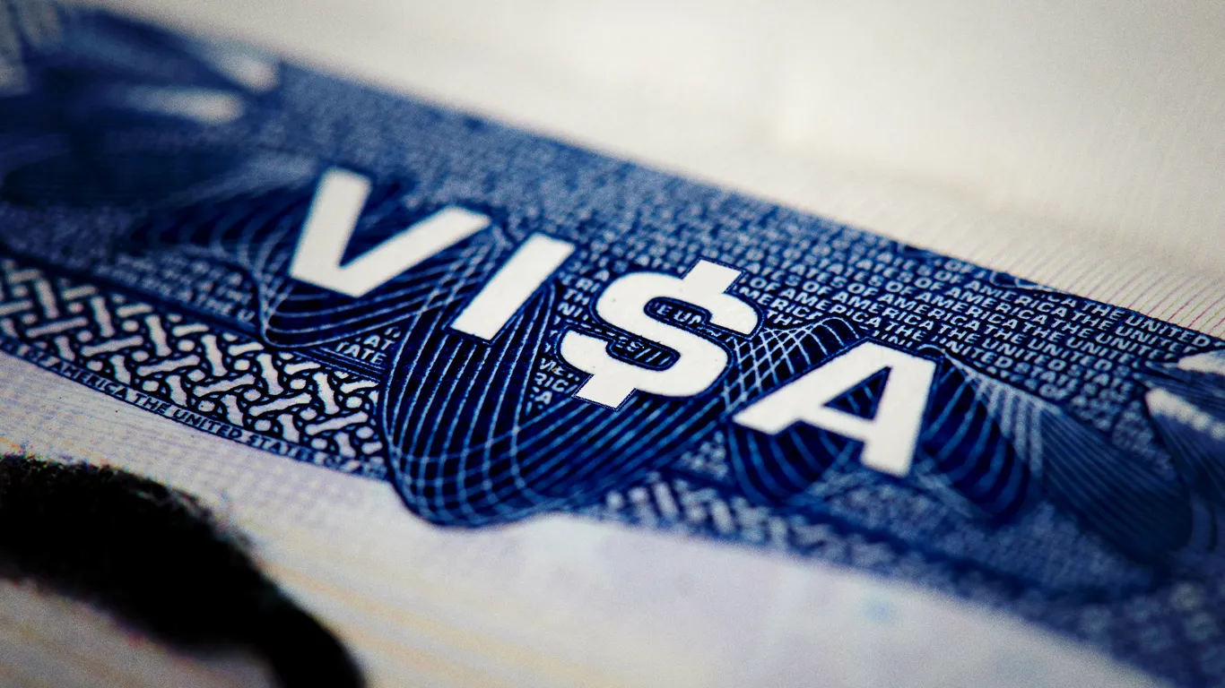 Featured image for Trump's $100K H-1B Visa Fee Sparks Legal and Industry Concerns