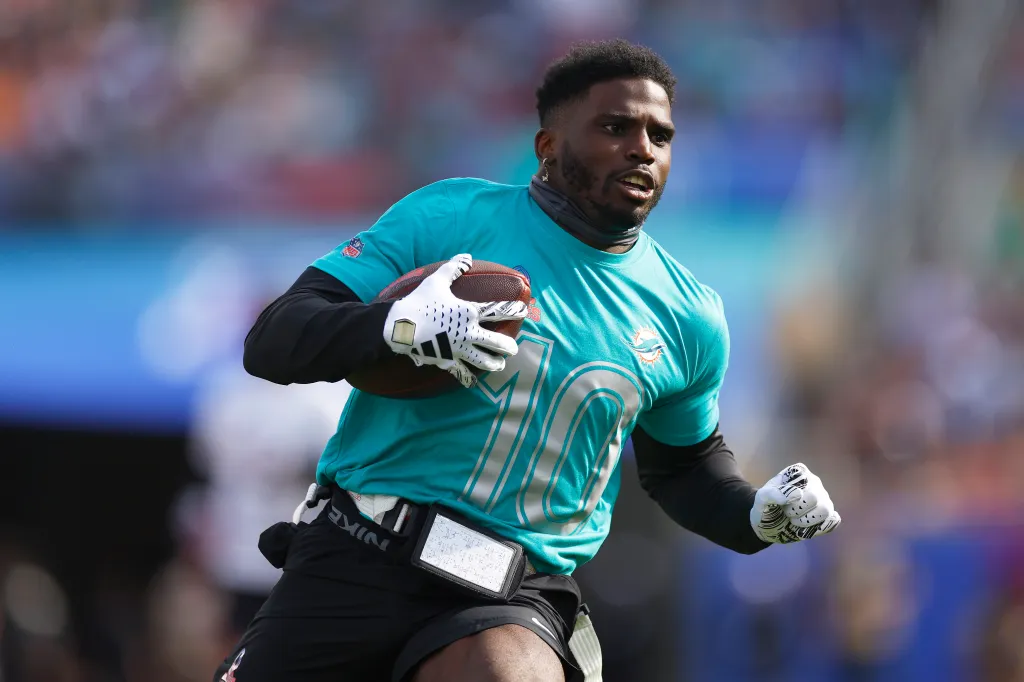 Model Sues Dolphins' Tyreek Hill for Leg Injury During Football Lesson