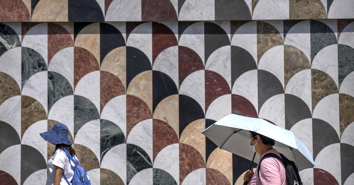 Featured image for Record-breaking heat wave hits Beijing and beyond.