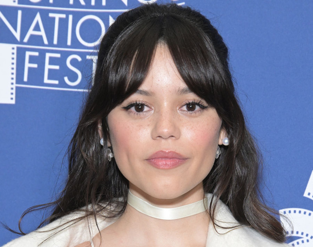 Featured image for Jenna Ortega Stuns in Risqué White Mini Dress at 'Miller's Girl' Premiere