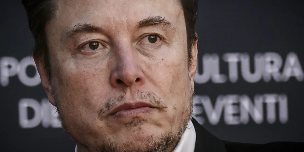 "Tesla Employees on Edge as Elon Musk Considers Staff Cuts"