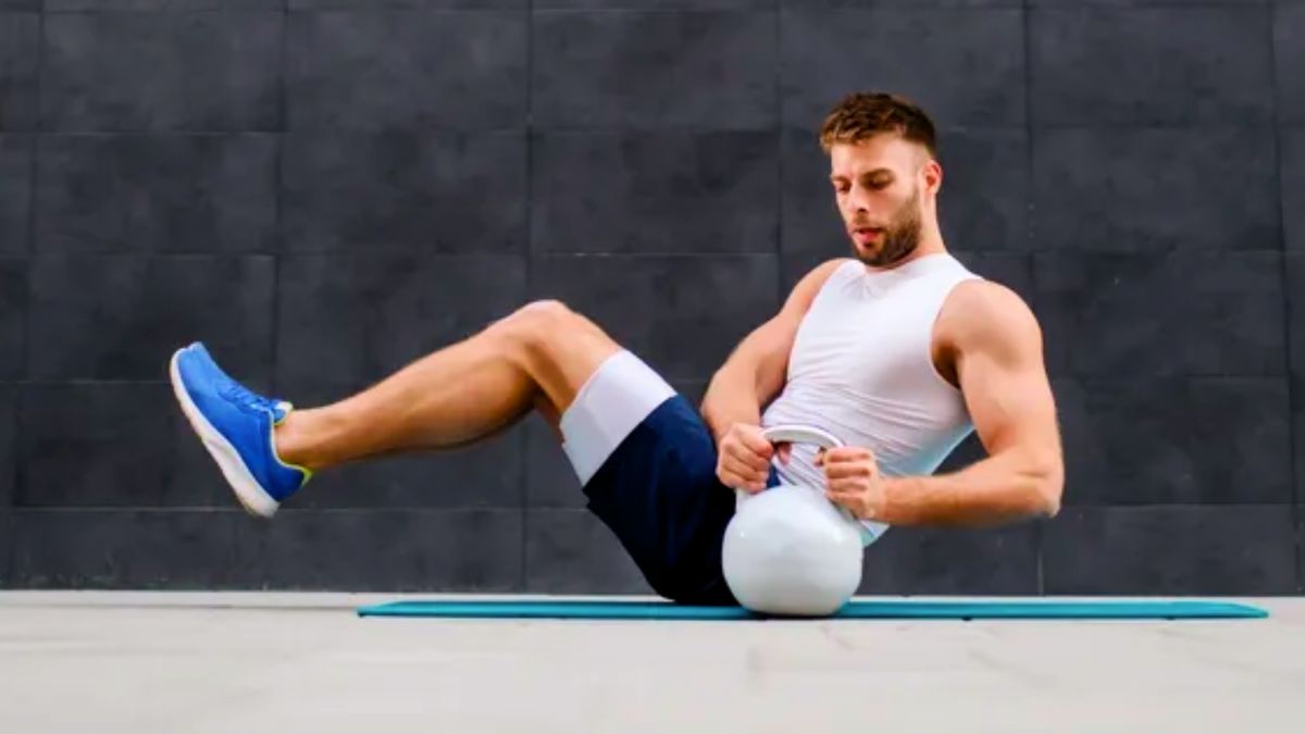 Featured image for "20-Minute Seated Kettlebell Workout for Upper-Body Strength: 10 Moves, No Dumbbells Needed"