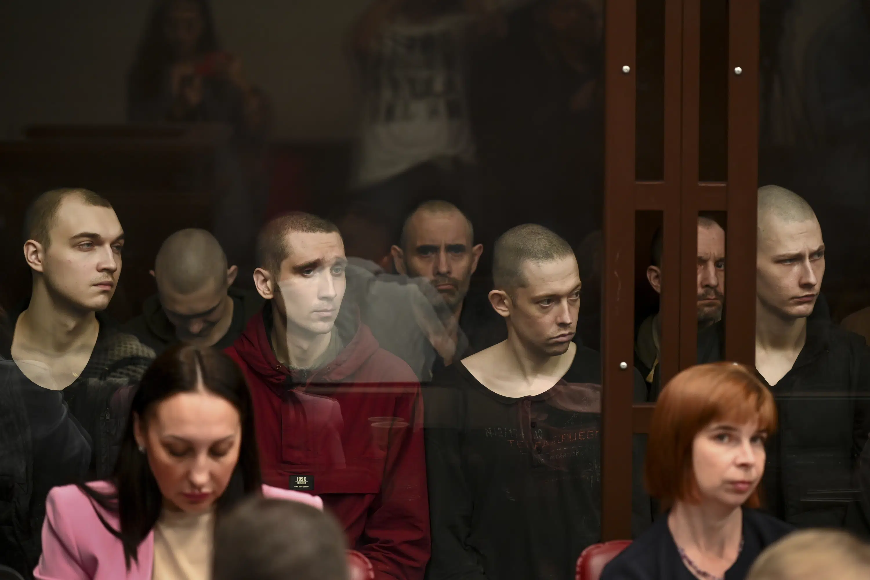 Ukrainian soldiers on trial in Russia after capture.