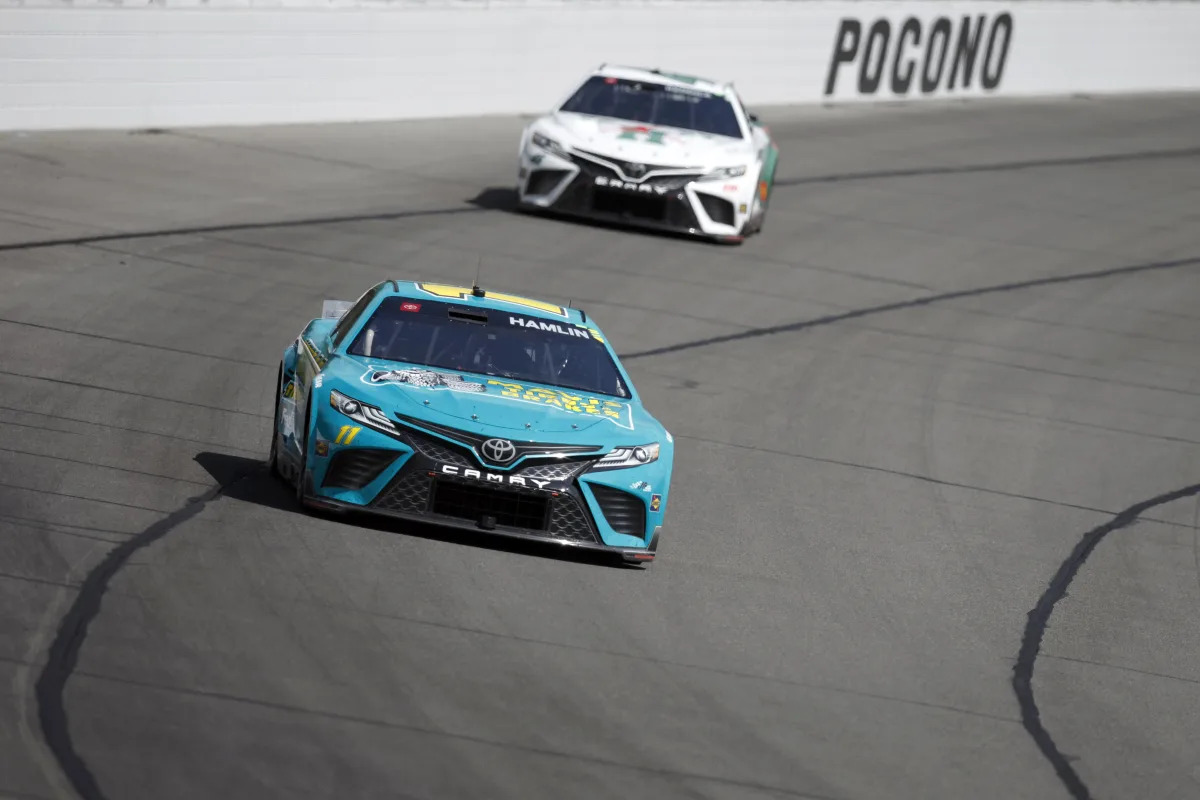 "Denny Hamlin's Historic Win at Pocono Marks Milestones for Toyota and NASCAR"