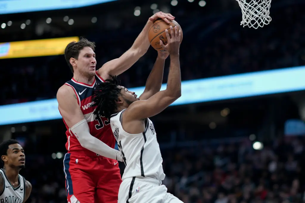 Featured image for "Cam Thomas Benched as Wizards' Defense Secures Victory Over Nets Amidst Texas Rangers Buzz"