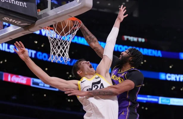 Lakers' playoff push gets boost as Jazz center Kessler likely out for season.