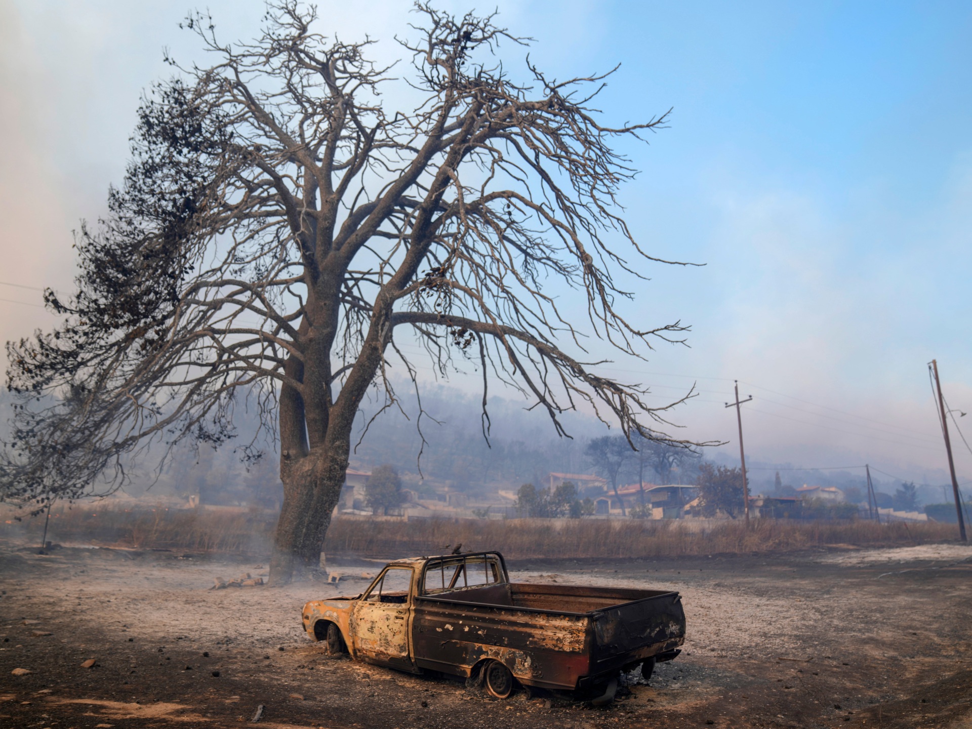 "Greece Battles Devastating Wildfires Amidst Extreme Heatwave"