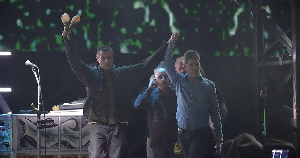 Featured image for Oasis Reunites for First Concert in 16 Years to Critical Acclaim