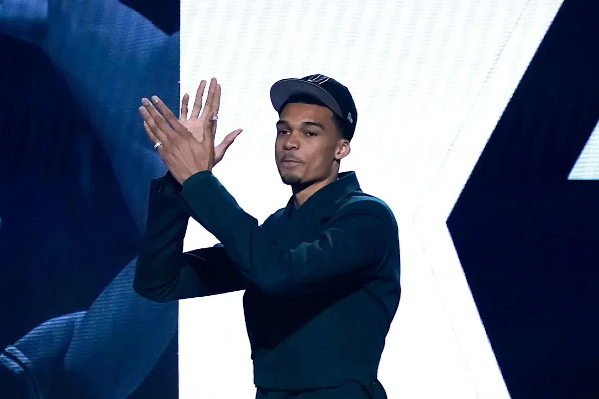 Victor Wembanyama dominates NBA headlines after being drafted first overall by the Spurs.