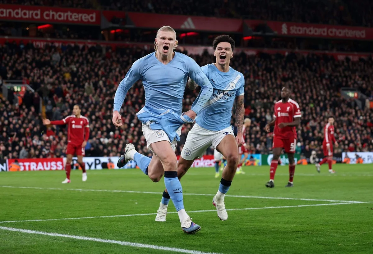 City edge Liverpool as Haaland seals stoppage-time win to keep title hopes alive