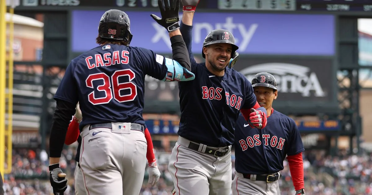 Red Sox defeat Tigers in home opener despite Turnbull's efforts.