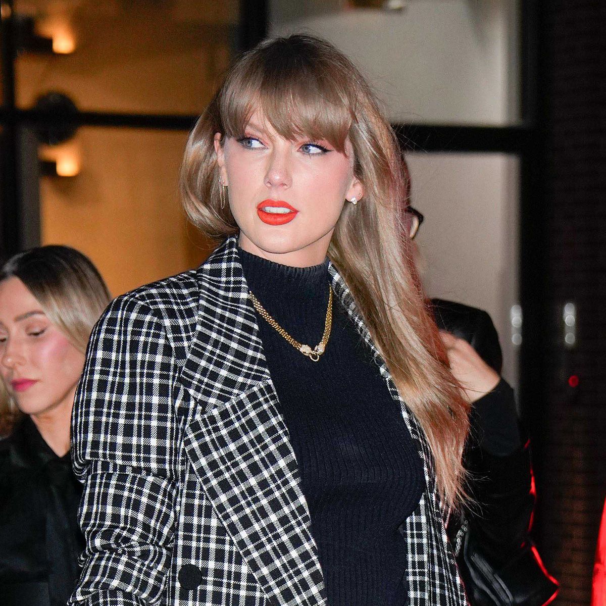 Featured image for Taylor Swift's NYC Fashion: Gucci Heels, Plaid Coats, and Luxury Accessories