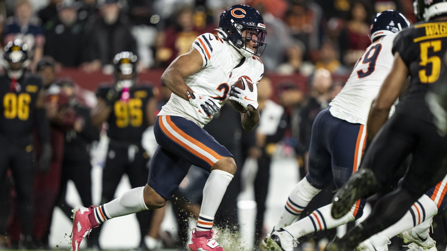 Featured image for D.J. Moore Hospitalized After Bears Win, Considered Day-to-Day