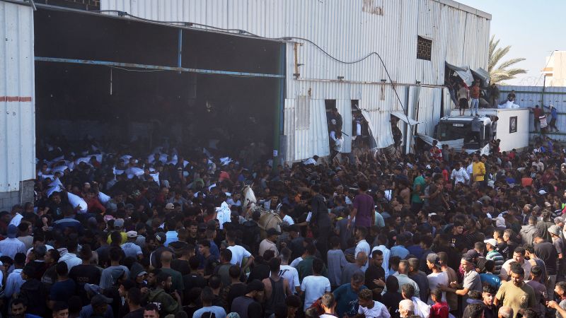Featured image for Hunger Crisis in Gaza: Palestinians Loot Food Warehouses Amid Rising Violence