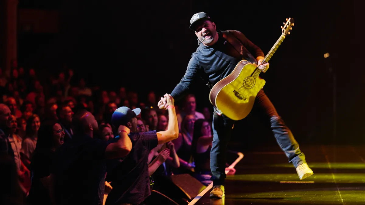 Garth Brooks and Trisha Yearwood surprise fans at Vegas residency opener.