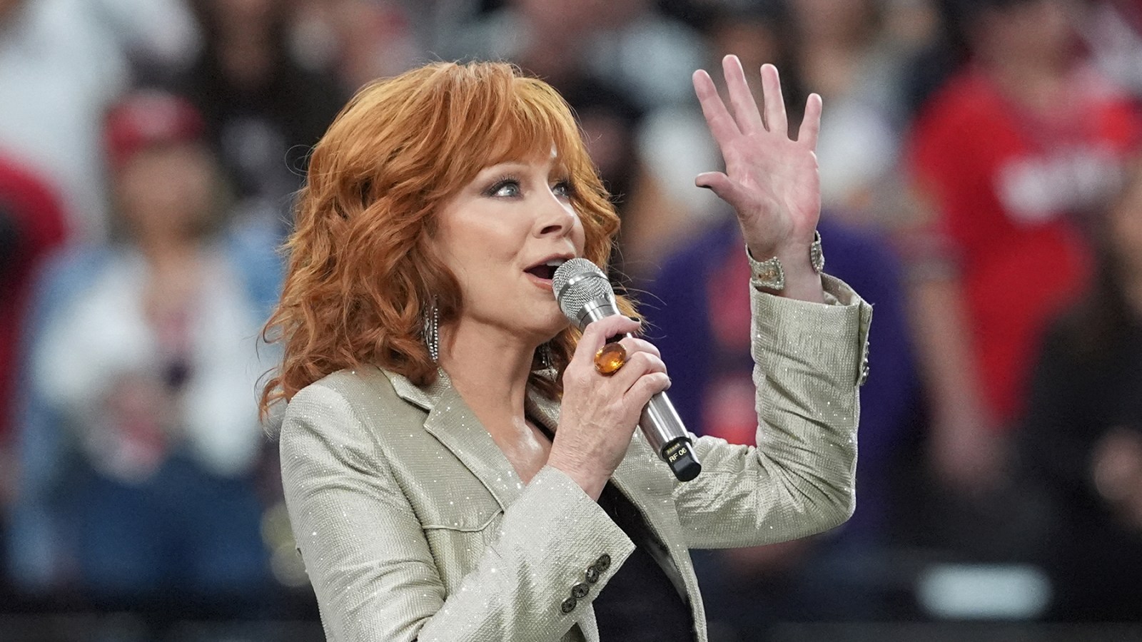 "Super Bowl 2025: Reba McEntire, Post Malone, and Andra Day Kick Off with Emotional National Anthem Performances"
