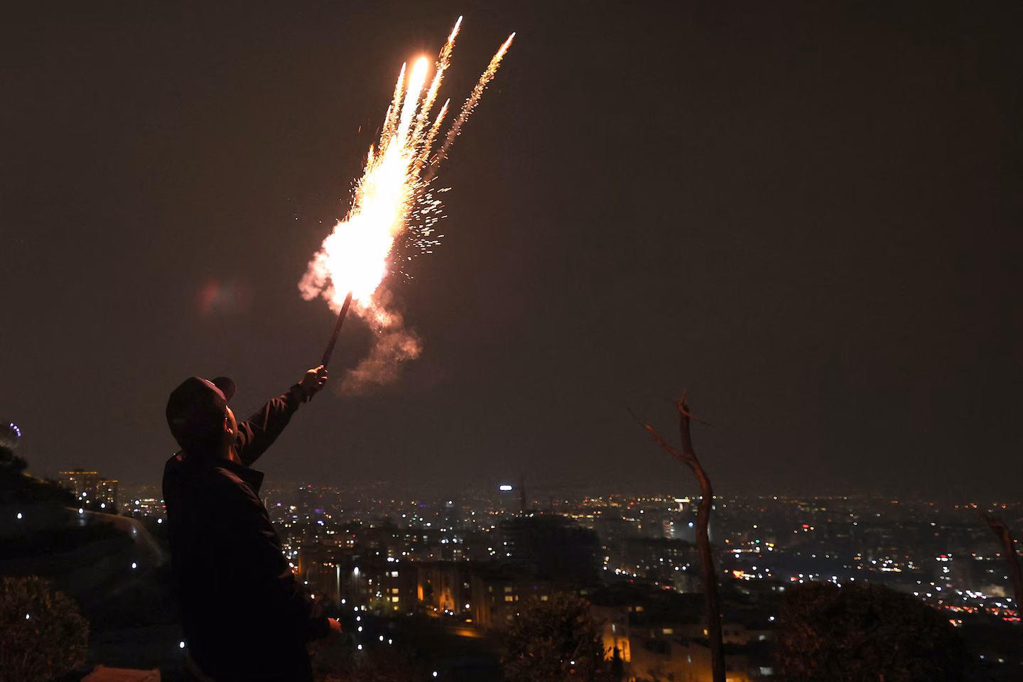 Anti-government protests escalate during Iranian fire festival.