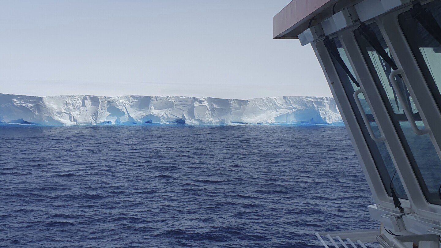"British research ship's lucky encounter with world's largest iceberg as it drifts out of Antarctica"